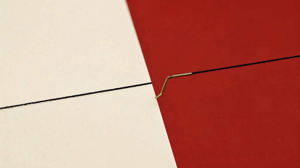 Illustration: A thin brass wire bends past a taut black thread boundary on cream paper, evoking an agent crossing a clearly drawn line despite explicit limits.